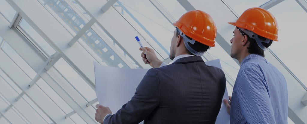 Commercial general contractors in Tennessee viewing building plans